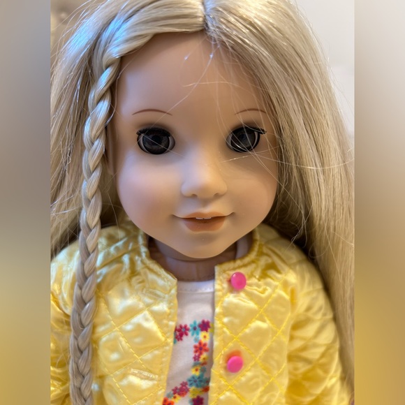 A Gently Used 18" American Girl Julie™ doll with warm brown eyes and blonde hair - Picture 4 of 6